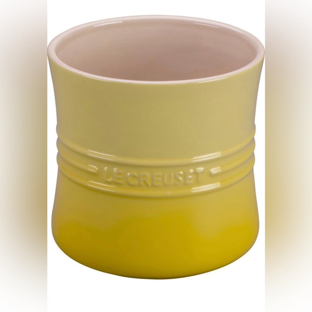 Like new condition; yellow le creuset utensil holder